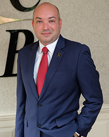 Portrait of Michael Serao, Executive Vice President and Chief Administrative Officer of FCSB.