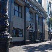 Picture of the exterior of First Central Savings Bank's Astoria Branch. First Central Savings Bank sign shown and FCSB logo with 24 hour ATM above the door.