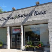 Picture of the exterior of First Central Savings Bank's Whitestone location. Signs states 24-Hour ATM.