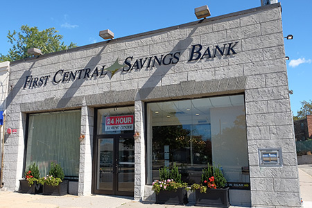 Picture of the exterior of First Central Savings Bank's Whitestone location. Signs states 24-Hour ATM.