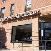 Picture of the exterior of First Central Savings Bank's Ditmars Branch. First Central Savings Bank outdoor sign shown.